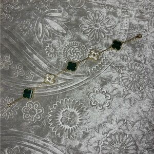 Gold Bracelet with Green Clover Accents and Crystal Flowers